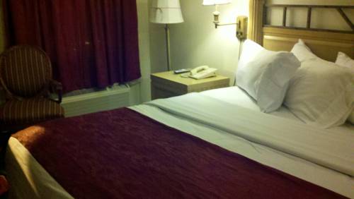 Imagen de la habitación del Hotel Jasmine Garden Inn. Foto 6