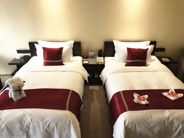 Imagen de la habitación del Hotel Jasmine International, Changsha. Foto 12