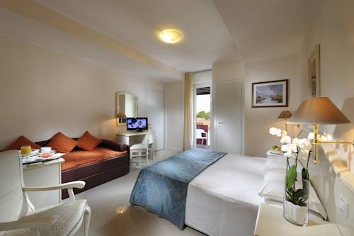 Imagen de la habitación del Hotel Jasminum. Foto 12