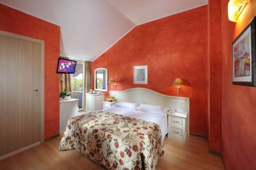 Imagen de la habitación del Hotel Jasminum. Foto 13