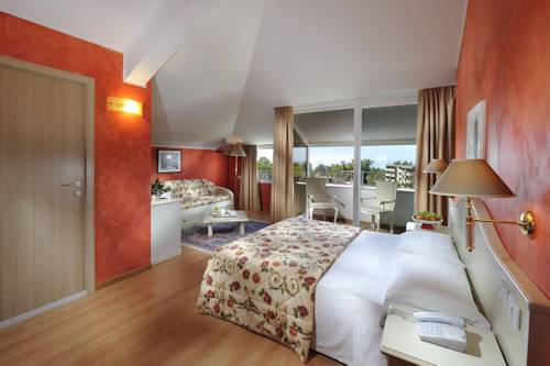 Imagen de la habitación del Hotel Jasminum. Foto 14