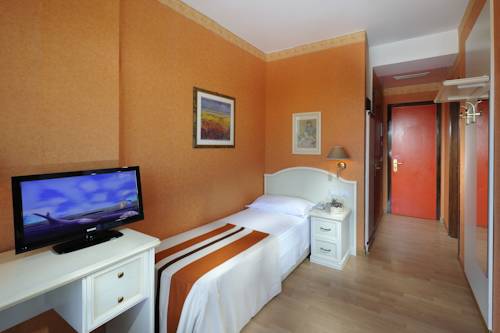 Imagen de la habitación del Hotel Jasminum. Foto 15