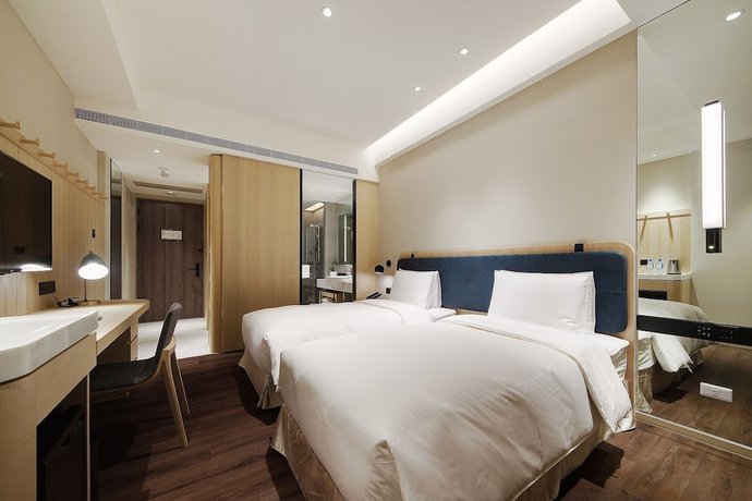 Imagen de la habitación del Hotel Jasper Young Hotel Banqiao. Foto 11
