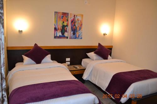 Imagen de la habitación del Hotel Jawhara Inn فندق الجوهرة. Foto 18