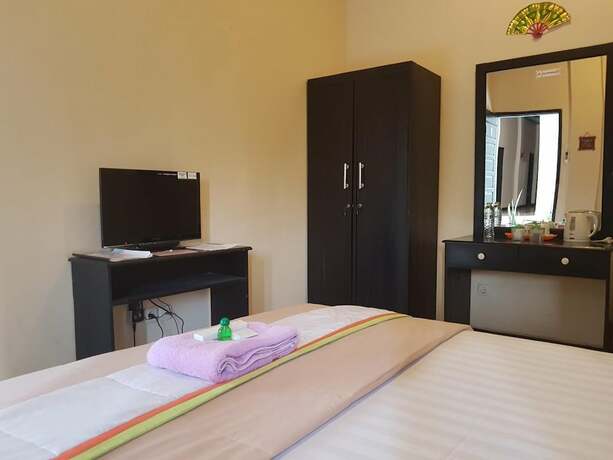 Imagen de la habitación del Hotel Jaya Phita Guest House. Foto 18