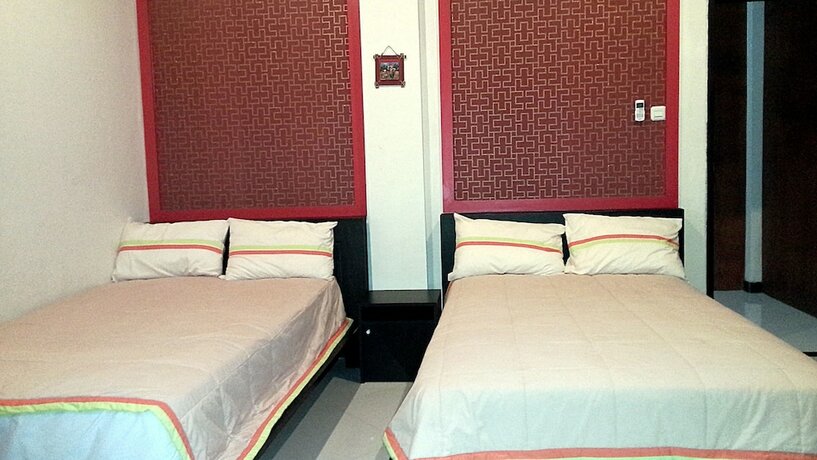 Imagen de la habitación del Hotel Jaya Phita Guest House. Foto 19