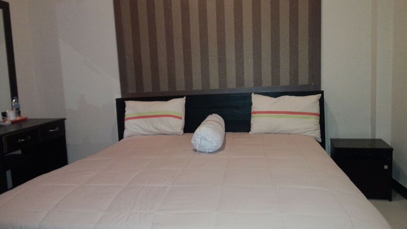 Imagen de la habitación del Hotel Jaya Phita Guest House. Foto 22