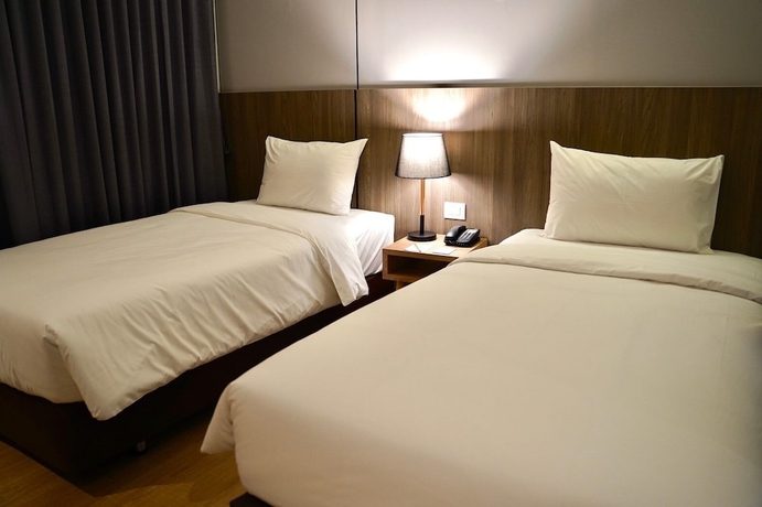 Imagen de la habitación del Hotel Jazzotel Bangkok. Foto 6