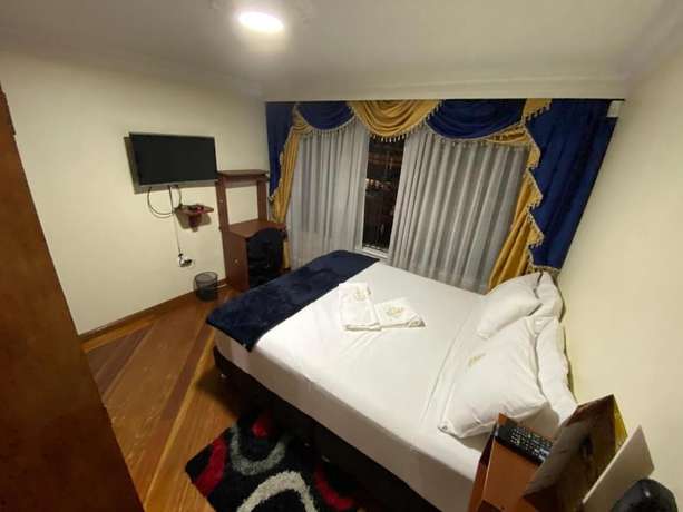 Imagen de la habitación del Hotel Jb Mansi&oacute;n, Bogot&aacute;. Foto 12
