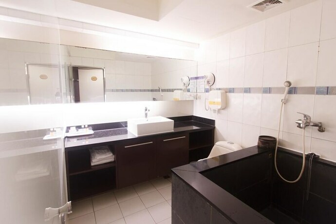 Imagen de la habitación del Hotel Jbg Hotspring Resort. Foto 22