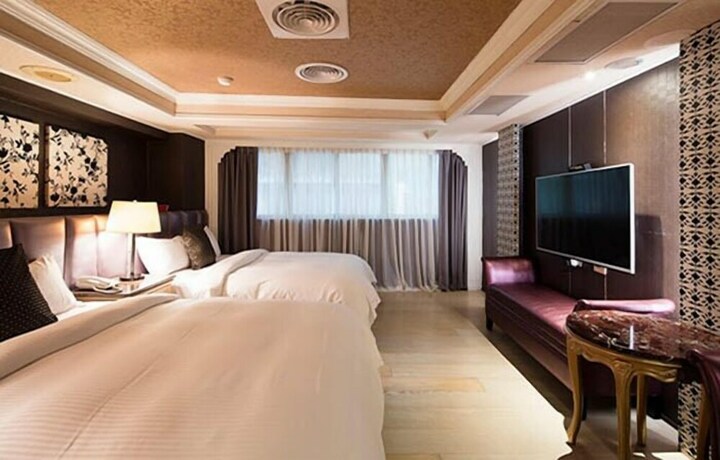 Imagen de la habitación del Hotel Jbg Hotspring Resort. Foto 25