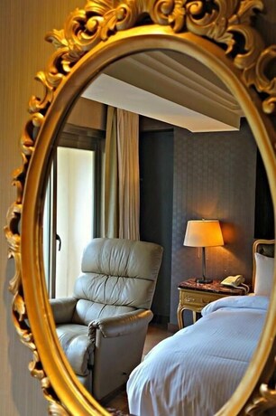 Imagen de la habitación del Hotel Jbg Hotspring Resort. Foto 32