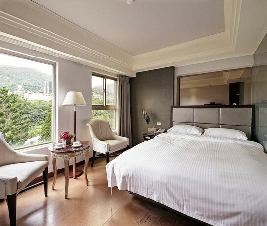 Imagen de la habitación del Hotel Jbg Hotspring Resort. Foto 33