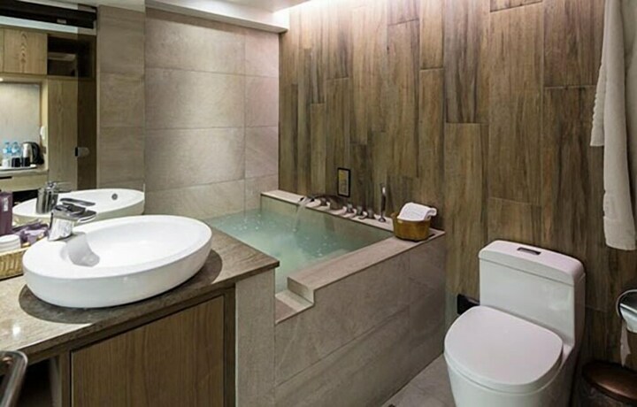 Imagen de la habitación del Hotel Jbg Hotspring Resort. Foto 34