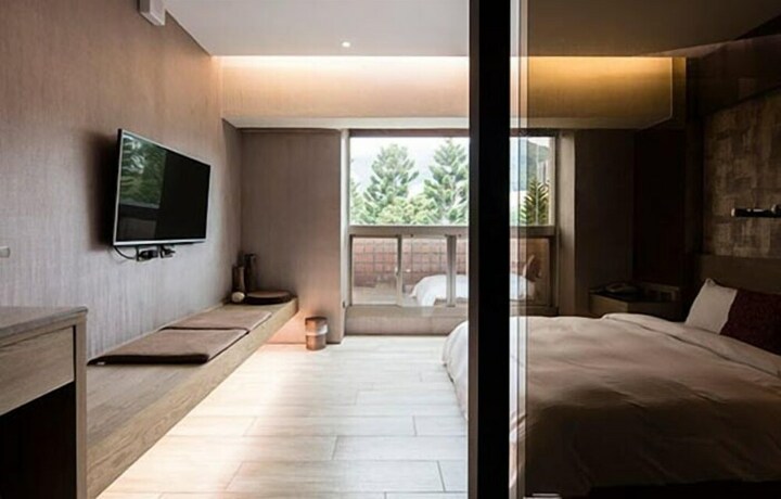 Imagen de la habitación del Hotel Jbg Hotspring Resort. Foto 35