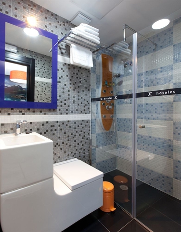 Imagen de la habitación del Hotel Jc Rooms Santo Domingo. Foto 11