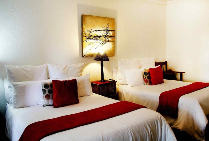Imagen de la habitación del Hotel J'cups Guest House. Foto 4