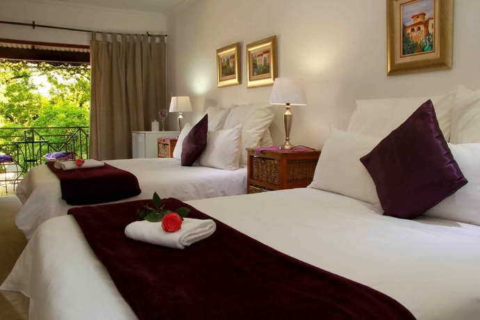 Imagen de la habitación del Hotel J'cups Guest House. Foto 5