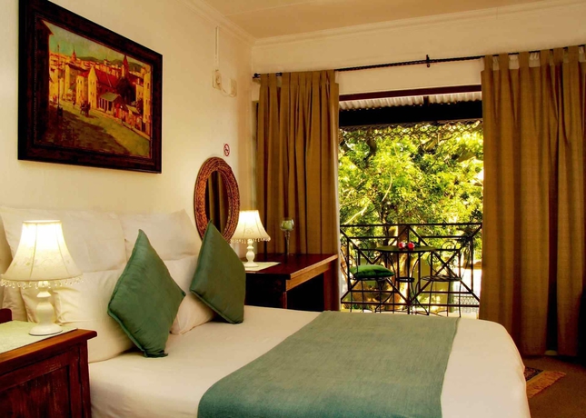 Imagen de la habitación del Hotel J'cups Guest House. Foto 7
