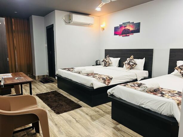 Imagen de la habitación del Hotel Jd Grand Inn. Foto 16