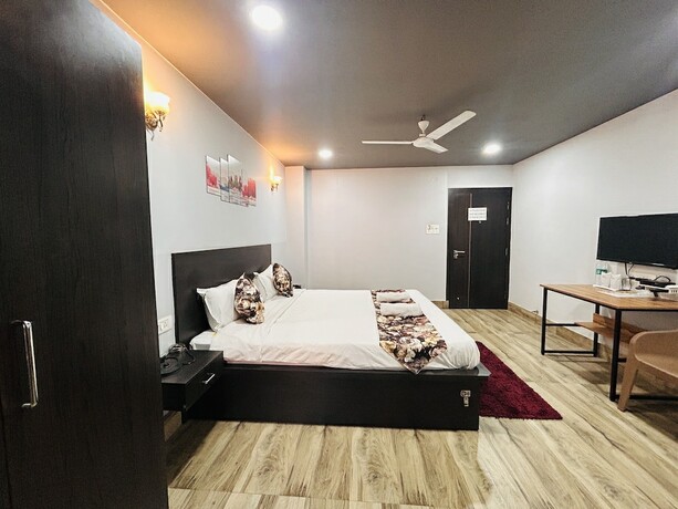 Imagen de la habitación del Hotel Jd Grand Inn. Foto 19