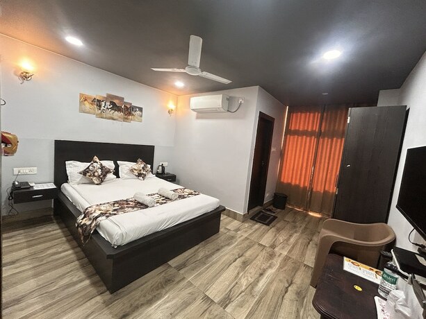 Imagen de la habitación del Hotel Jd Grand Inn. Foto 20