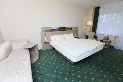 Imagen de la habitación del Hotel Jeddinger Hof Land- und Seminarhotel. Foto 6