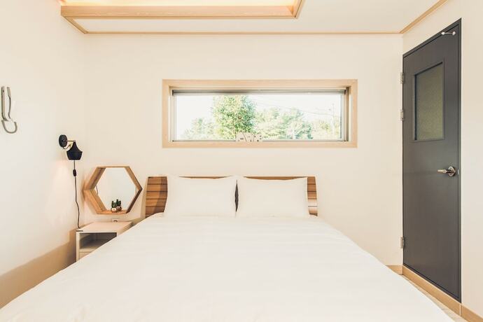 Imagen de la habitación del Hotel Jeju Abientot. Foto 19