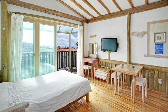 Imagen de la habitación del Hotel Jeju Beautiful Resort. Foto 21