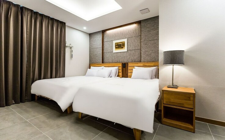 Imagen de la habitación del Hotel Jeju City Hall. Foto 19
