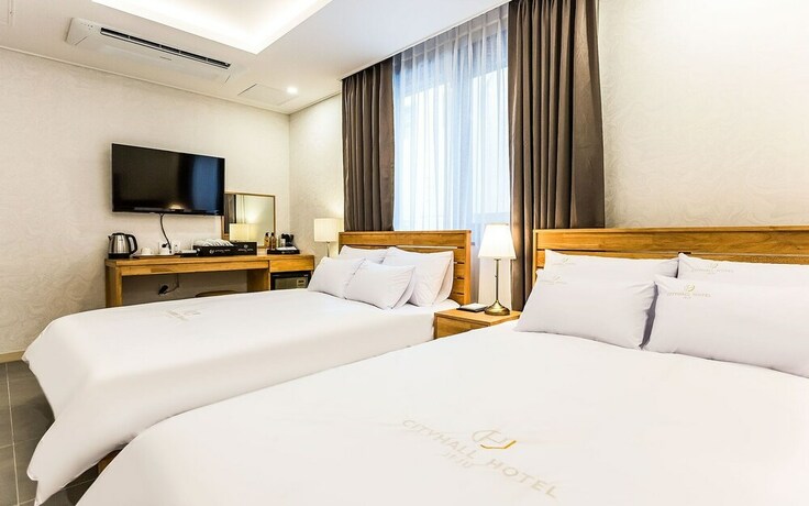 Imagen de la habitación del Hotel Jeju City Hall. Foto 30