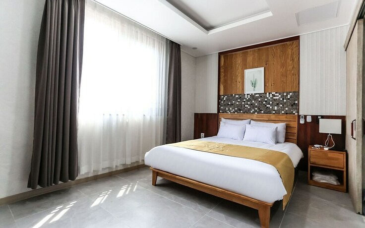 Imagen de la habitación del Hotel Jeju City Hall. Foto 31