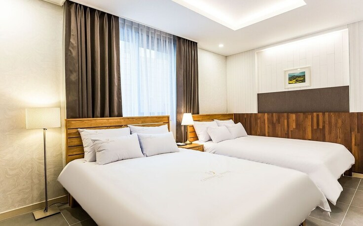 Imagen de la habitación del Hotel Jeju City Hall. Foto 35