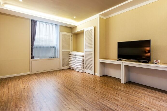 Imagen de la habitación del Hotel Jeju Galaxy. Foto 13