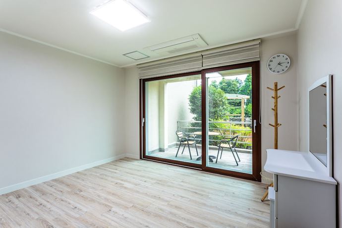 Imagen de la habitación del Hotel Jeju Garden Pension. Foto 8