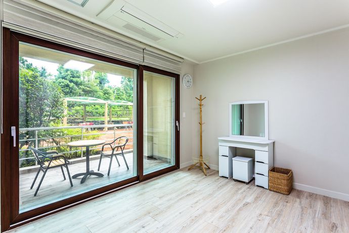 Imagen de la habitación del Hotel Jeju Garden Pension. Foto 9