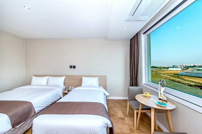 Imagen de la habitación del Hotel Jeju In. Foto 28
