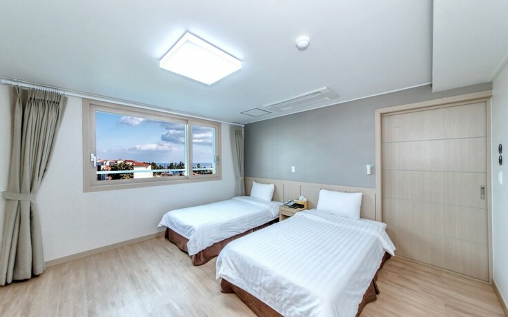 Imagen de la habitación del Hotel Jeju Jungmun J Hill. Foto 8