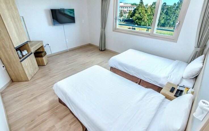 Imagen de la habitación del Hotel Jeju Jungmun J Hill. Foto 9