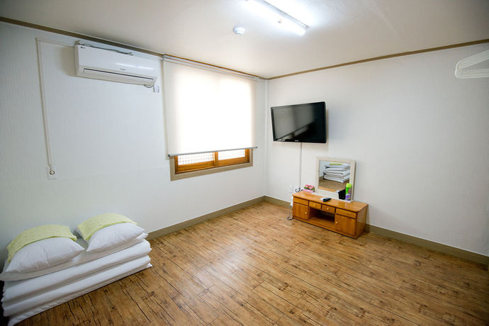 Imagen de la habitación del Hotel Jeju Masil Guesthouse. Foto 9