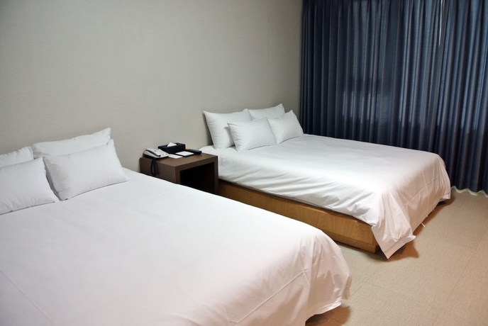 Imagen de la habitación del Hotel Jeju Noblesse Hotel. Foto 11