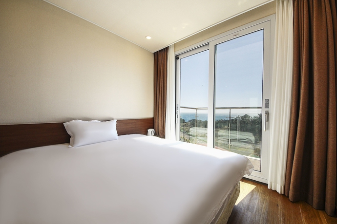 Imagen de la habitación del Hotel Jeju Ocean Blue. Foto 11