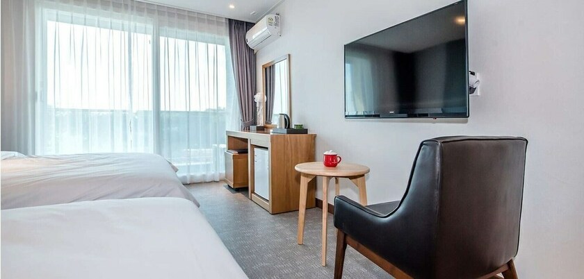 Imagen de la habitación del Hotel Jeju Ocean Square Resort. Foto 12