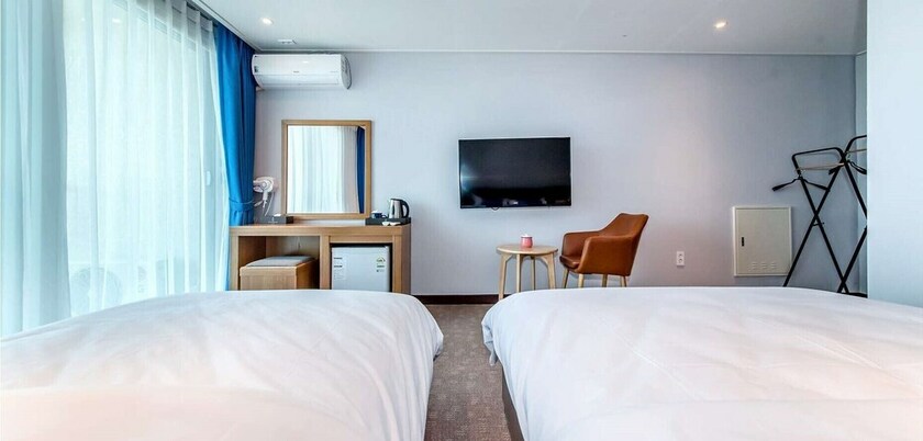 Imagen de la habitación del Hotel Jeju Ocean Square Resort. Foto 19