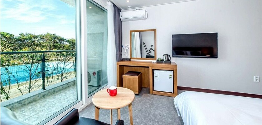 Imagen de la habitación del Hotel Jeju Ocean Square Resort. Foto 26