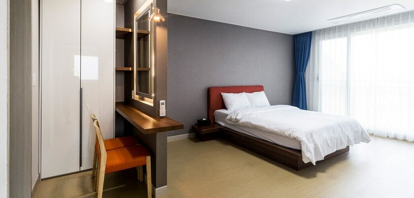 Imagen de la habitación del Hotel Jeju Ocean Square Resort. Foto 28