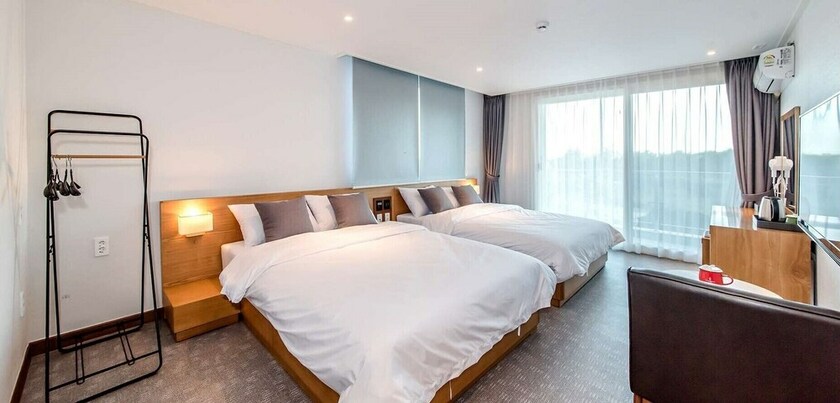 Imagen de la habitación del Hotel Jeju Ocean Square Resort. Foto 35