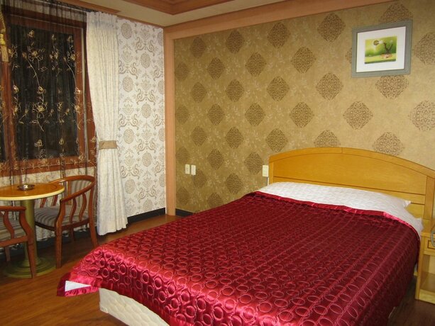 Imagen de la habitación del Hotel Jeju Olleh. Foto 18