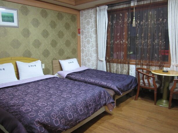 Imagen de la habitación del Hotel Jeju Olleh. Foto 20