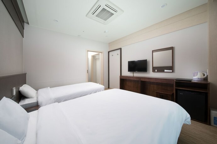 Imagen de la habitación del Hotel Jeju Palace. Foto 18